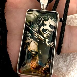 Silver and Black Skull Pendant Necklace